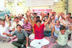 Kashmiri pandits protest in support of their pending demands in Jammu on Wednesday