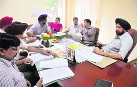 Mayor Hakam Singh Giaspura (extreme right) and MC officials at the Finance and Contract Committee meeting in Ludhiana on Wednesday
