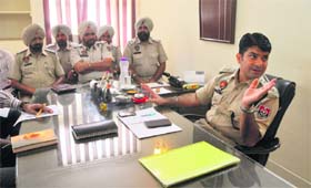 ACP (Traffic) Swapan Sharma gives details about a plan to ease traffic flow in the city during a press conference
