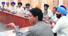 ADC (D) Rishipal Singh addresses a meeting with the members of advisory committees at the Circuit House in Ludhiana on Wednesday