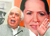 Union minister Kapil Sibal makes a point in New Delhi on Wednesday. 