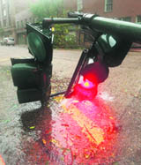 A downed streetlight lies in the rain caused by Hurricane Isaac in New Orleans.