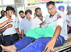 The injured security guard, Jasmail Singh, at the GMCH-32 on Thursday. 