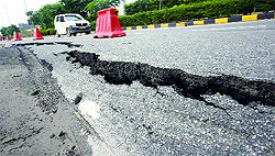 A big crack appeared on the road near Terminal 3 of Indira Gandhi International Airport in New Delhi on Thursday