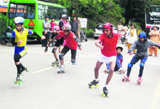 A road race in progress during the regional roller skating meet in Mussoorie on Thursday.