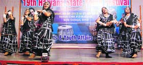 Schoolgirls perform a group dance during the inaugural ceremony of the state-level Youth Festival in Sirsa on Thursday