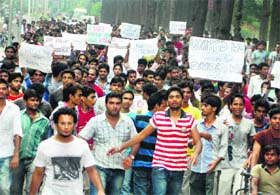Students of the National Institute of Technology protest in Kurukshetra on Thursday