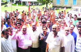 Workers of the Nurpur Block Congress Committee hold demonstration before the office of the Block Development Office in Nurpur on Thursday