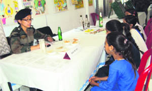 A lady doctor examines students in Batote on Thursday. 