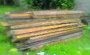 Logs of timber that were seized from the office of the Kehmil forest division in Kupwara. 