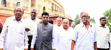 Samajwadi Party chief Mulayam Singh Yadav with TDP and Left leaders outside Parliament in New Delhi on Thursday.
