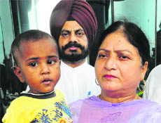 The boy with Councillor Kuldeep Kaur and MLA Kuljit Singh Nagra. 