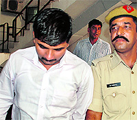 Accused Aman Kumar being produced at district courts in Panchkula on Friday