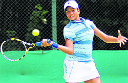 Vaibhavi Deshmukh plays a shot during a tennis tournament at Sector 10 in Chandigarh on Friday