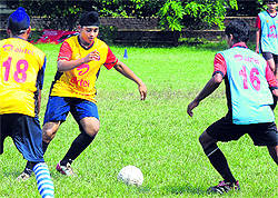 Players take part in football trials held at the football stadium in Sector 17, Chandigarh, on Friday