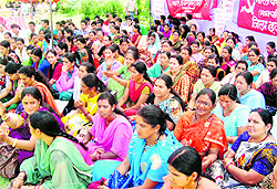 Workers of the CPI (ML) hold a dharna against the policies of the Central government at Pithoragarh on Friday
