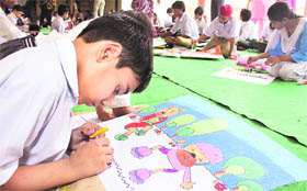 Schoolchildren participate in a painting competition organised by the District Child Welfare Council at the Red Cross Bhawan in Jalandhar on Friday.