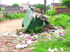 A container placed by A2Z Waste Management Ltd for the collection of garbage in a locality in Ludhiana. 