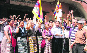 Local residents and Tibetans take part in the Flame of Truth in Ludhiana on Friday.