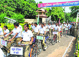 Women constables participating in a bicycle rally against female foeticide.