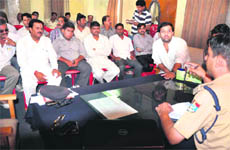 Circle Officer Trafic JR Joshi holds a meeting with representatives of political parties and organisations in Haridwar on Saturday.