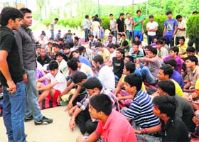 Students of the National Institute of Technology stage a dharna in Kurukshetra on Saturday