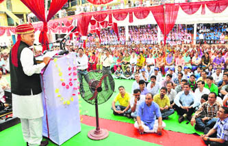 Chief Minister PK Dhumal addresses a public meeting at Toani Devi in Hamirpur on Saturday.