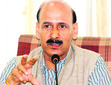 IPH Minister Ravinder Ravi addresses mediapersons in Dharamsala on Saturday.