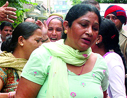 A grieving relative of Kamaljit Kaur, who committed suicide in Jalandhar