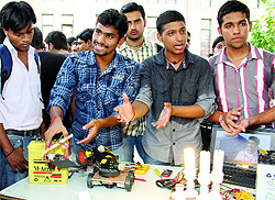 Senior students of Lovely Professional University explain about robotics on Saturday