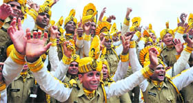Members of the Central Industrial Security Force (CISF) celebrate after the combined passing-out parade of some 453 trainees at the National Industrial Security Academy (NISA) in Hyderabad on Saturday.