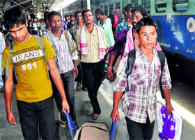 North-East students board a special train to Bangalore at Guwahati Railway Station.