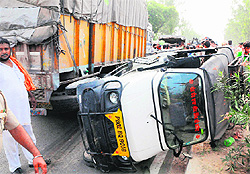 An accident between a truck and a tempo on the Amritsar-Jalandhar GT Road left two minor siblings killed and their parents injured on Sunday