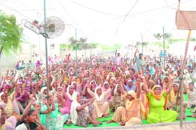 Many families from villages in Lambi constituency held a rally in Singhewala village on Sunday demanding five marla plots to construct their home