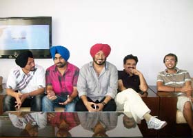 Comedian Jaswinder Bhalla (right) with the team of the Punjabi film Aiven Raula Pe Gaya in Bathinda on Sunday