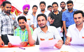 Panjab University Students Union (PUSU) president Sukhjit Brar addresses media persons during the release of the partys election manifesto at Panjab University on Sunday.