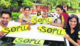 Girls campaign for SOPU on the PU campus on Sunday.
