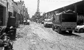 A road at Lalru Mandi that is in poor shape.
