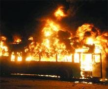 A mob set a low-floor bus on fire at Mayur Vihar Phase-3 in New Delhi after a biker was injured during a police checking on Sunday.