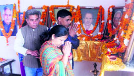 People offer tributes to the martyrs on the occasion of the 18th anniversary of the September 2 police firing incident in Mussoorie on Sunday