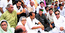 Virbhadra Singh condoles Ajay Mahajan, state Congress general secretary, in Nurpur on Sunday