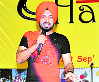 Gurpreet Ghuggi performs at Hamir Utsav in Hamirpur on Saturday night.