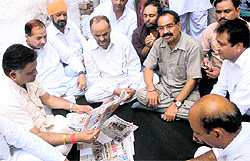 Former minister Manoranjan Kalia consoles family members of Shivali at their house in Jalandhar on Sunday