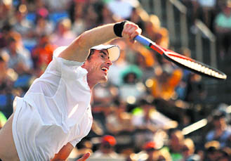 Andy Murray serves during his four-set third-round victory over Feliciano Lopez.