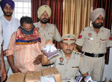 Civil Lines SHO Gurdev Bhalla showing the drugs seized from a chemist in Bathinda on Monday. 