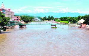 A scenic panoramic view of the Garhwal Himalayan range behind the Ganga canal bridge in Haridwar on Monday.