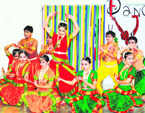 Students of Manav Rachna International School present a dance during a function. 