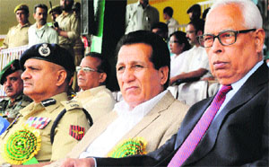Governor NN Vohra and Minister for Sports RS Chib watch a football match between Manipur and West Bengal at the inauguration of the 58th National School Games at Bakshi Stadium in Srinagar on Monday