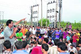 Kashmiri Pandits during a protest rally at Jagti township in Jammu on Monday