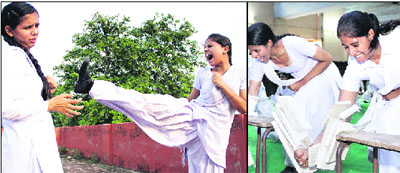 Students of Cantonment Board Senior Secondary School take lessons in self-defence in Jalandhar on Monday.